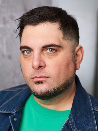 Headshot of Tim Realbuto