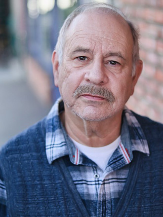 Headshot of John Combs
